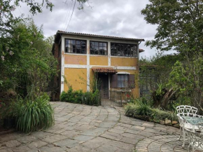 Espaço Ello suíte externa cantinho na serra Miguel Pereira